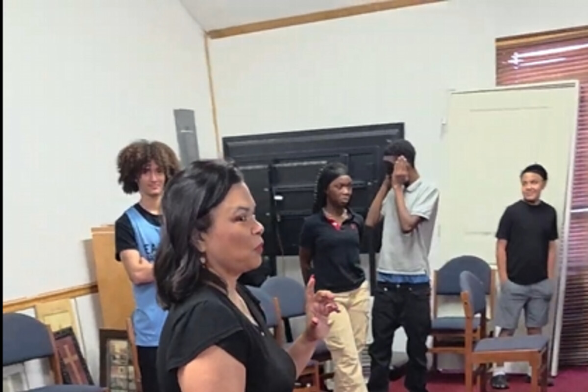 Mrs. Weems facilitating role-play activity with New Way students