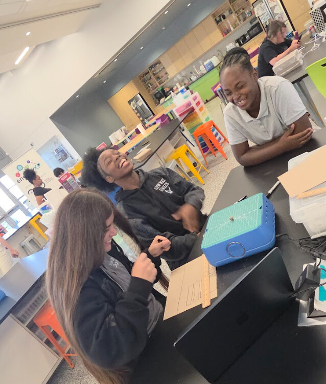 New Way Eagles students laughing during STEM workshop